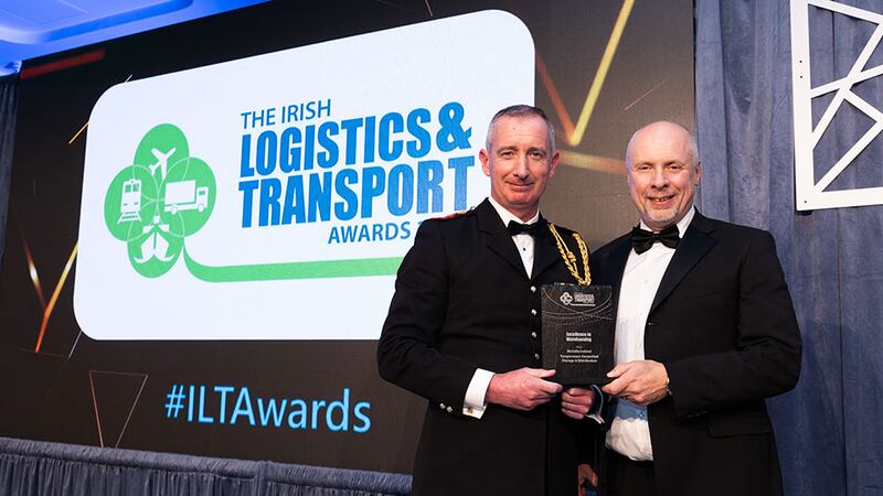 Gareth Prendergast, director of logistics of Irish Defence Forces presents the excellence in warehousing award to Brian Beattie, McCulla