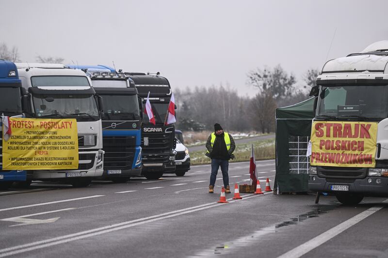 A Polish truck driver stands at a protest blockade point on the Dorohusk Polish-Ukrainian border crossing. Photograph: Omar Marques/Getty Images