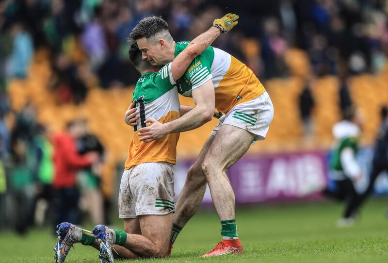 An emotional Ruairí McNamee and Conor McNamee celebrate Offaly's  victory over Meath at the final whistle in Tullamore. It was their first victory over the Royal County since 2000. Photograph: Evan Treacy/Inpho 