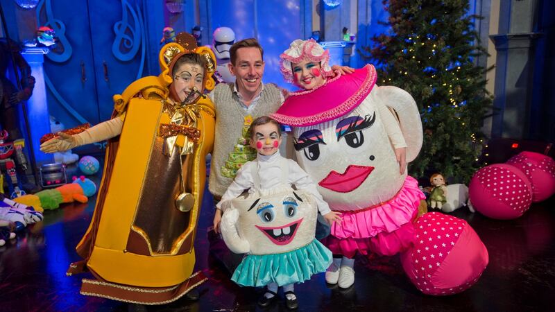 Ryan Tubridy with Jem O’Connor (9) from Navan, Luke O’Connor (4) from Dublin and Megan Larney (10) from Monaghan on the set of this year’s ‘Late Late Toy Show’. Photograph: Brenda Fitzsimons