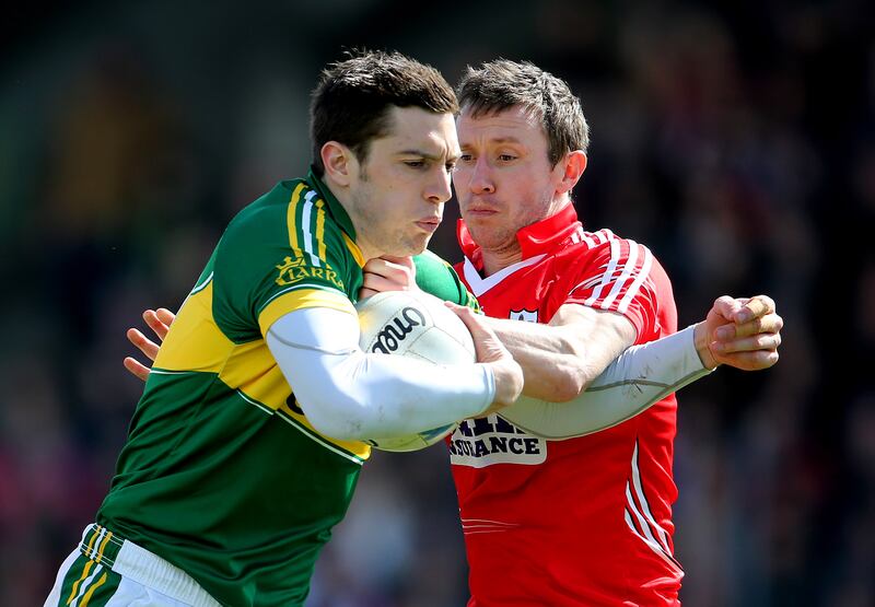 Kerry's midfielder David Moran Cork's John Hayes grapple for the ball during the League during the league match of April 2014. File photograph: Inpho