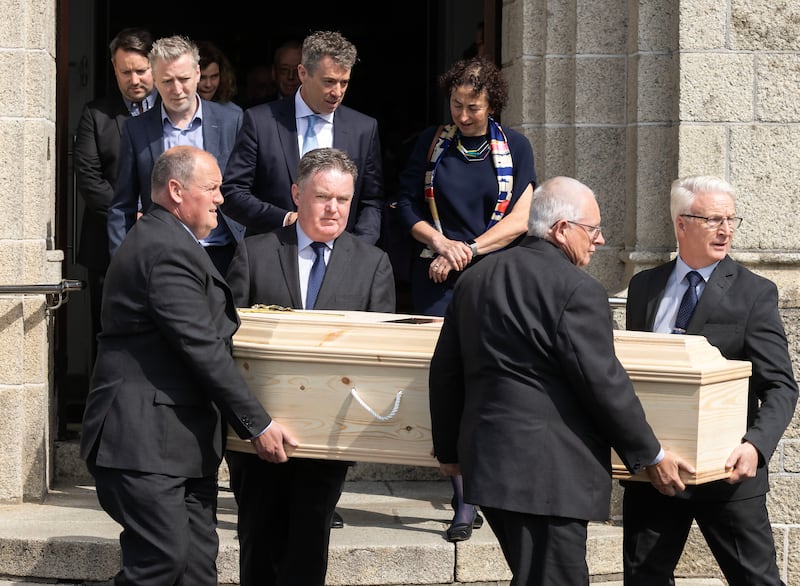 Banotti's remains are carried from the church. Photograph: Colin Keegan/Collins Dublin