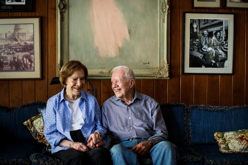 Former President Jimmy Carter and Rosalynn Carter, at home in Plains in 2017. Ms Carter, who helped propel him from rural Georgia to the White House in a decade and became the most politically active first lady since Eleanor Roosevelt, died on November 19th, 2023 aged 96. Photograph: Dustin Chambers/The New York Times
                      