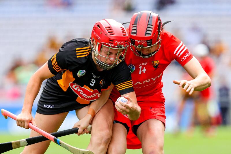 Kilkenny's Grace Walsh and Katrina Mackey of Cork in their All-Ireland senior camogie championship quarter-final in Croke Park. Photograph:  
Bryan Keane/Inpho