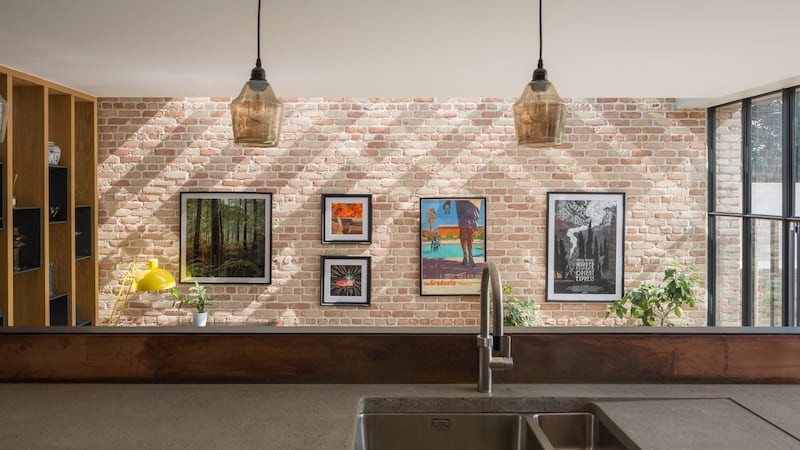 Exposed brick detail in the kitchen. Photograph: Ste Murray