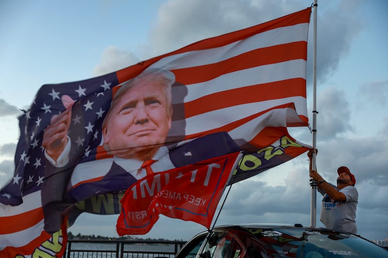 A man shows his support for Donald Trump near his Mar-a-Lago resort in Palm Beach, Florida on November 13th. Photograph: Joe Raedle/Getty Images