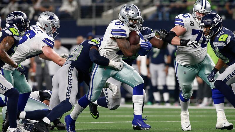 Ezekiel Elliott carries during the Dallas Cowboys’ win over the Seattle Seahawks. Photograph: Mike Stone/EPA