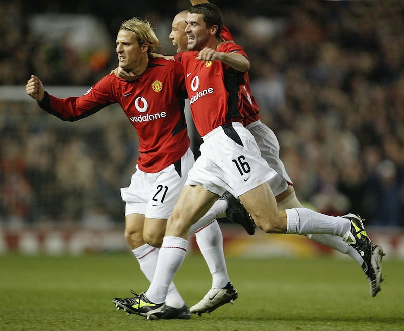 Diego Forlán with team-mate Roy Keane during their time at Manchester United. Photograph: Laurence Griffiths/Getty Images