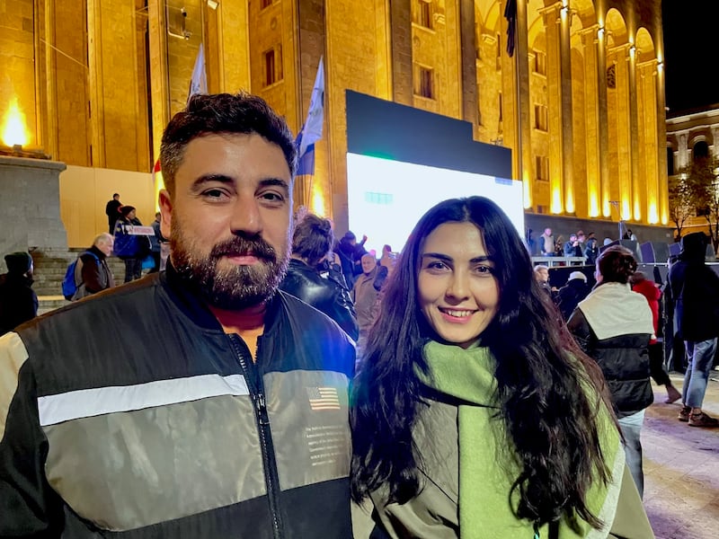 Georgian couple Otar Kavtelashvili and Lika Gonikishvili at an opposition protest in Tbilisi on Monday night. Photograph: Daniel McLaughlin