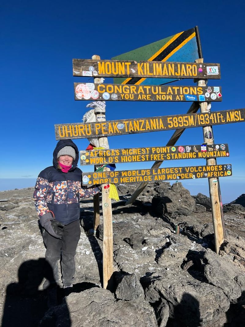 Shauna Bowers at the summit of the world’s tallest free-standing mountain, which is 5,895m (19,341ft) above sea level