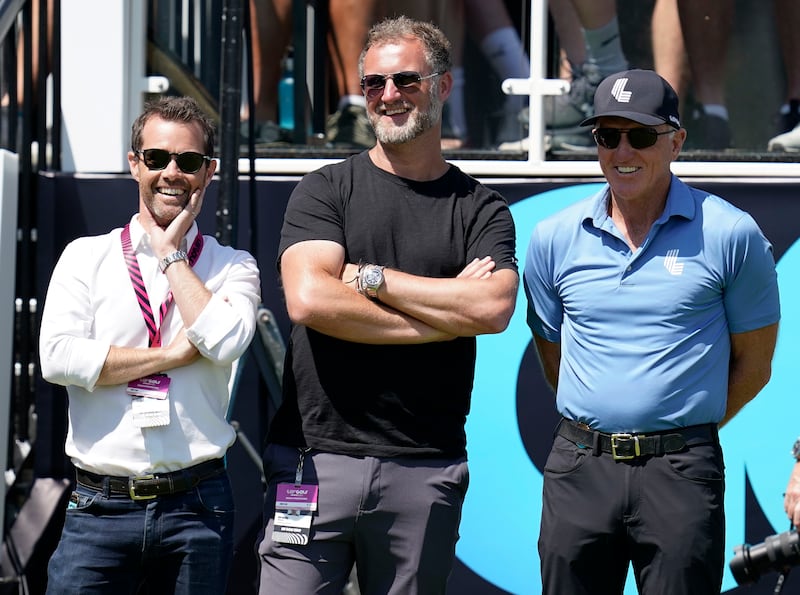 LIV Golf executives Gary Davidson (left), Richard Marsh (centre) and Greg Norman during day one of the LIV Golf League. Photograph: Andrew Matthews/PA Wire