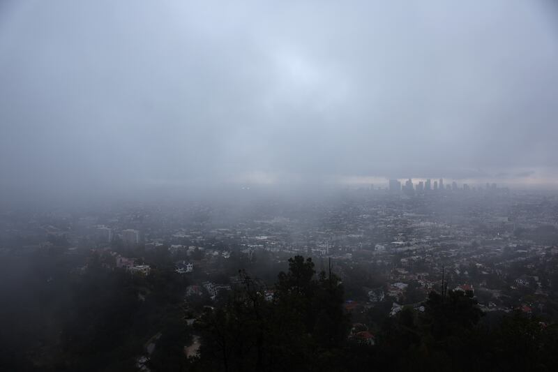 Downtown Los Angeles is blanketed with fog and rain on Friday. Photograph: Mario Tama/Getty