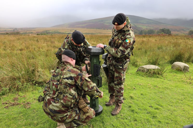 Members of the Defence Forces prepare the anti-tank system for firing. Photograph: Dara Mac Dónaill/The Irish Times









