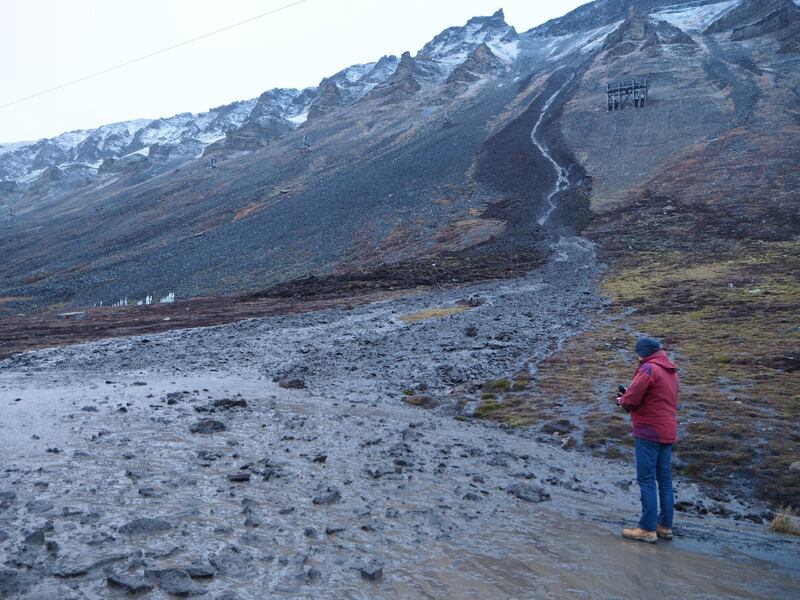 Active layer sliding inside the Longyearbyen valley. Heavy overnight rain resulted in sediment moving 25 metres down the hill and destroying the road. Photograph: Hanne Christiansen