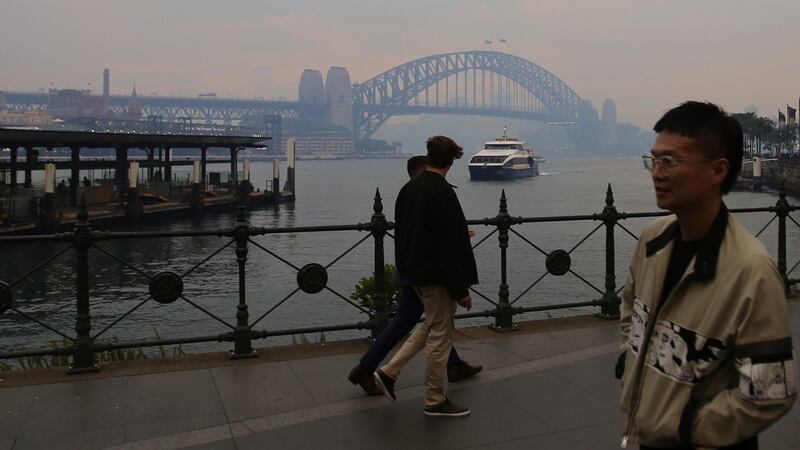 A view of the Sydney Harbour Bridge engulfed by smoke haze from bushfires in Sydney, on December 2nd. Photograph: Steven Saphore/EPA