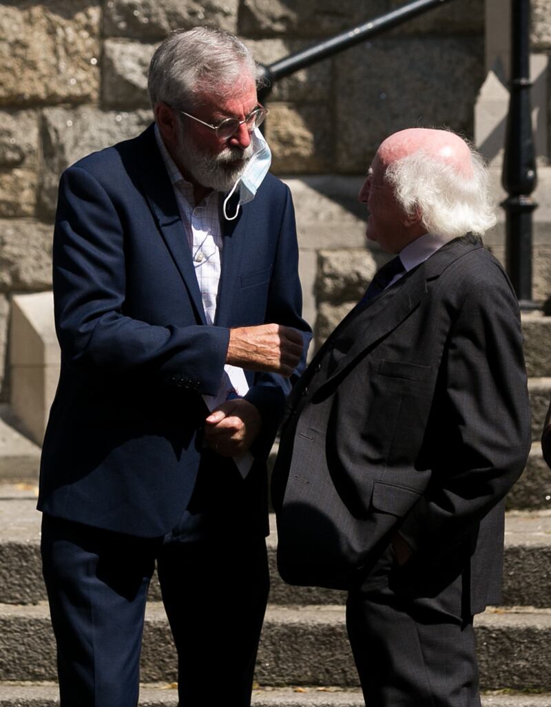 Former Sinn Féin leader Gerry Adams and President of Ireland Michael D Higgins at the funeral service of publisher Michael O'Brien at Christ Church, Rathgar, Dublin. Photograph: Gareth Chaney/ Collins Photos