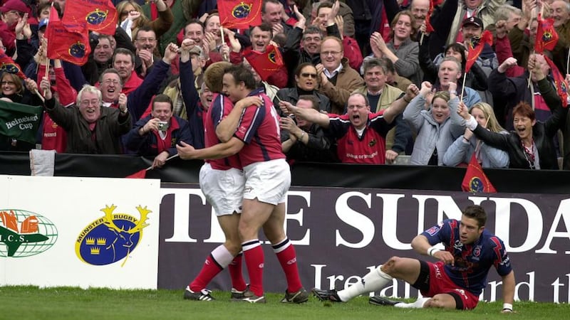 Munster fans share a moment. Photograph: Eric Luke