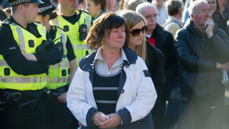 Marian Buckley (centre front), the mother of Karen Buckley,  is comforted as she joins hundreds of mourners at a vigil for her daughter in George Square, Glasgow. Photograph: Jane Barlow/PA Wire.