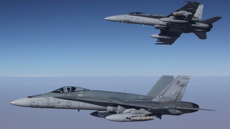 This handout photo from September 11th shows Royal Australian Air Force F/A-18A Hornets from Australia’s Air Task Group flying in formation  over Syria. Photograph: AFP