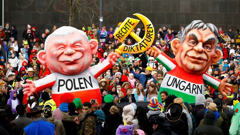 A carnival float depicting leader of the ruling party Law and Justice  in Poland Jaroslaw Kaczynski and Hungarian Prime Minister Viktor Orban at the traditional Rosenmontag  carnival parade in Duesseldorf, Germany, in  February  2018. File photograph: Thilo Schmuelgen/Reuters