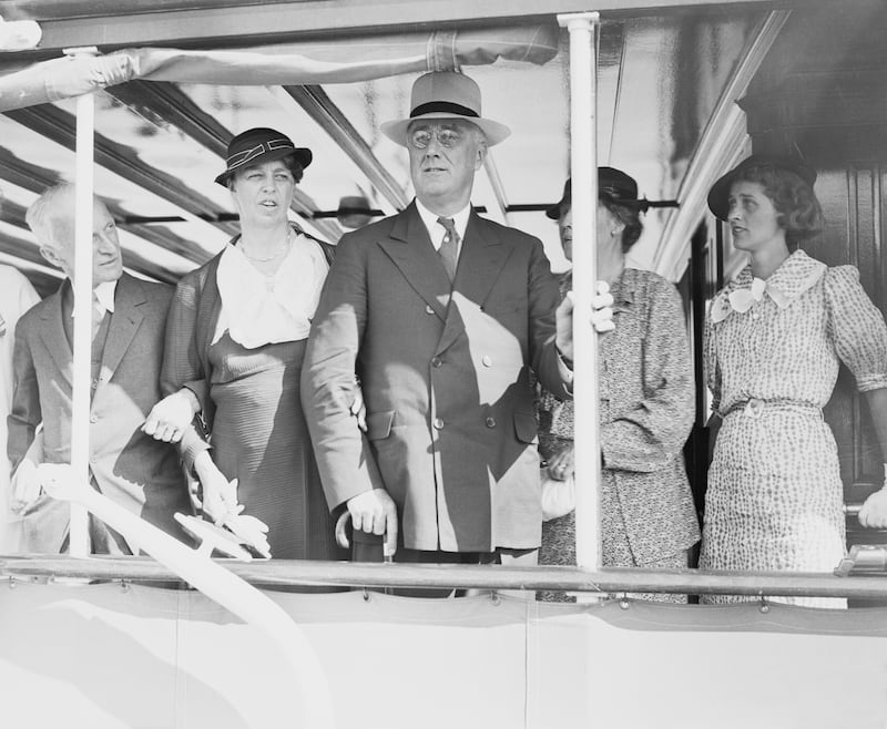 Former US president (1933-45) Franklin D. Roosevelt and his wife (second left) among a party on the presidential yacht Sequoia, following the conferring of an honorary degree on the president at Yale University at New Haven, Conn. Photograph: Bettman Archilve