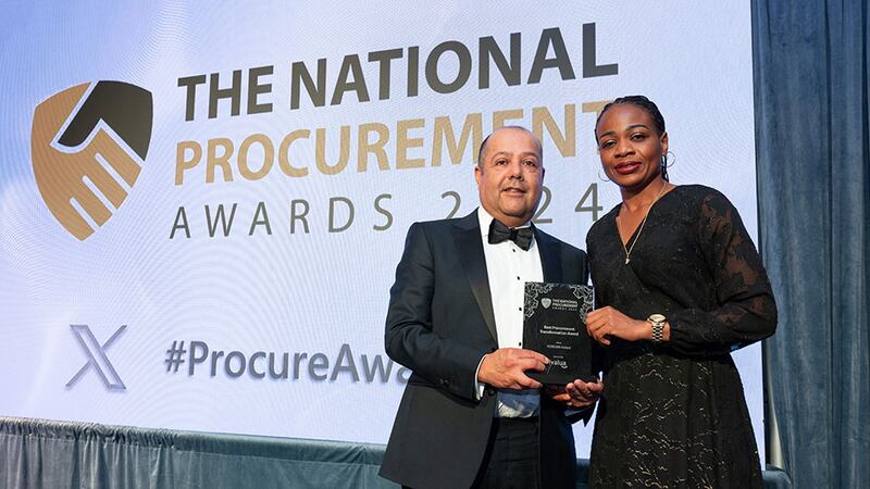 JC Abella, alliances director at Ivalua, presents the best procurement transformation award to Funmilola Oreagba, Heikeken Ireland