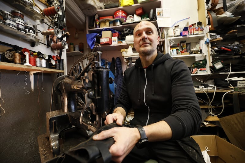 Latvian 'Archie' Sakele has travelled the world repairing footwear.  Photograph: Nick Bradshaw