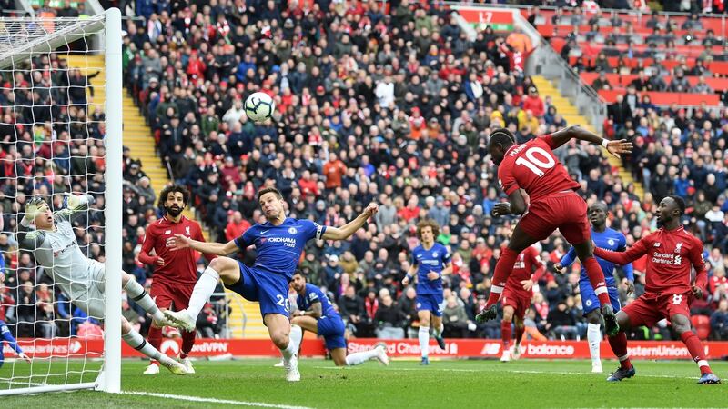 Sadio Mane scores Liverpool’s opener against Chelsea. Photograph: Michael Regan/Getty