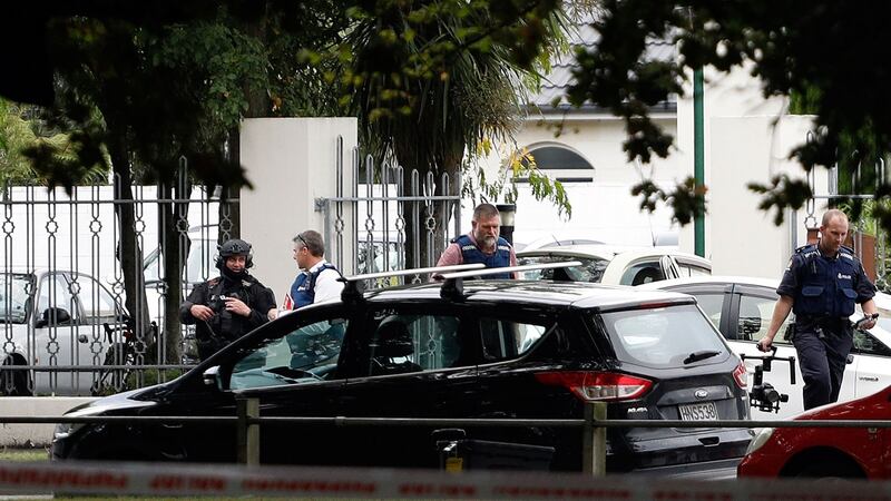 Police officers are seen at the Masjid al Noor mosque after a shooting incident in Christchurch. Photograph: Tessa Burrows/AFP/Getty Images