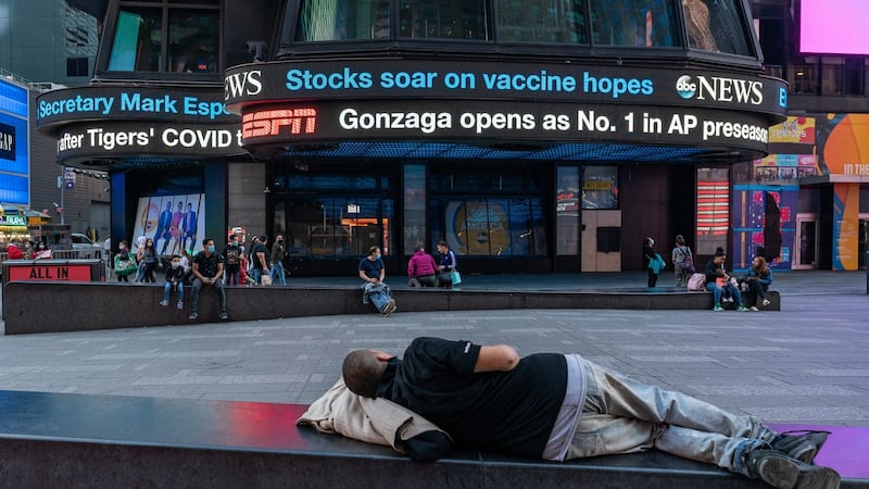 An electronic billboard in New York’s Times Square announces ‘stocks soar on vaccine hopes’ on November 9th after Pfizer announced positive results in its vaccine trials. Photograph: David Dee Delgado/Getty Images