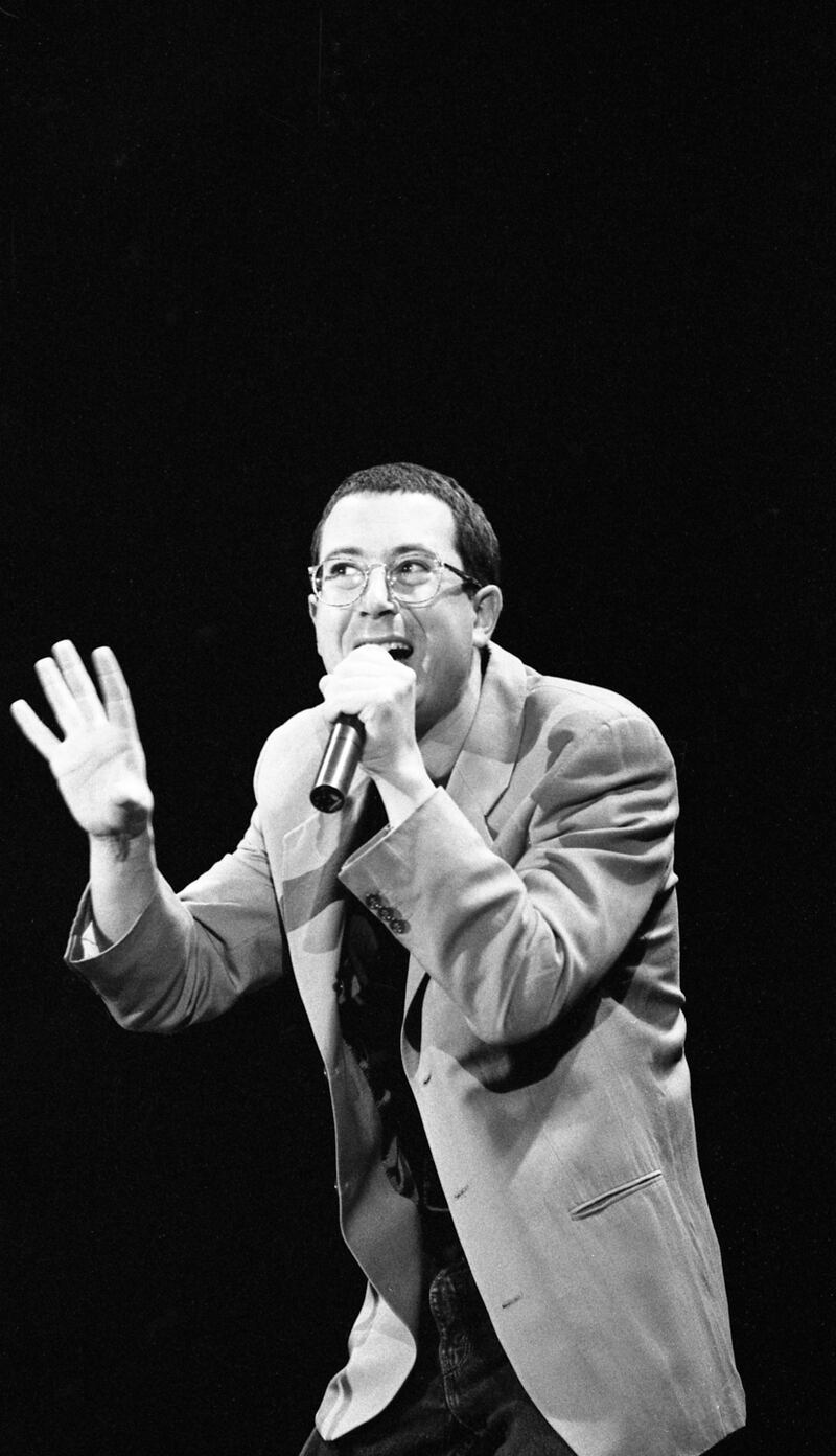 On tour again: Ben Elton performs on stage at the Point in Dublin in 1993. His first tour for 15 years tour starts at the Olympia in Dublin. Photograph:  Dominic Ledwidge O’Reilly/Getty