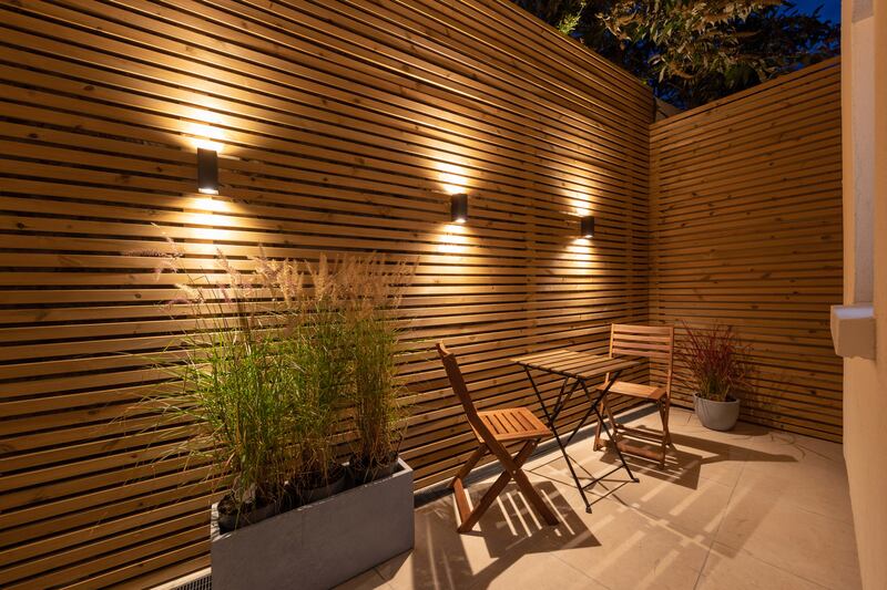 Wood panelling is continued in the rear patio