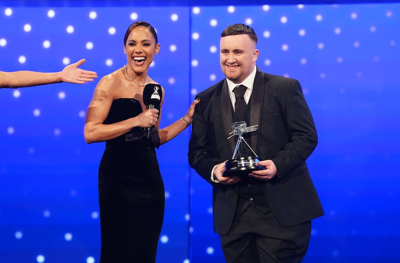 Luke Littler and the BBC Young Sports Personality of the Year 2024 award alongside Alex Scott. Photograph: David Davies/PA