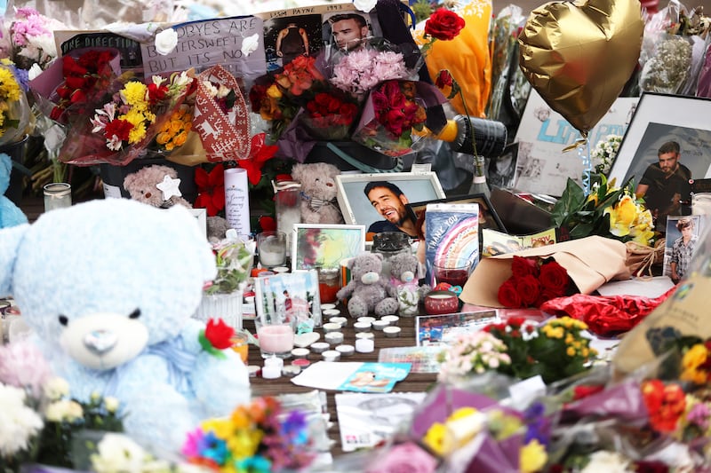 Flowers and tributes to Liam Payne in West Park, Wolverhampton, England after the former One Direction singer died following a fall from the balcony in his hotel in Buenos Aires, Argentina. Photograph: Cameron Smith/Getty Images