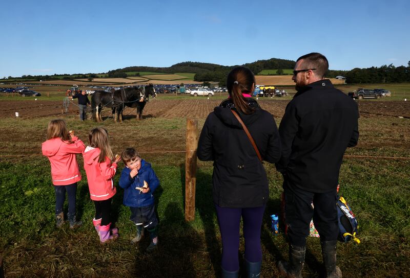 Saoirse, Orla, Cathal, Clare and Don Coomey from Timoleague, West Cork watching the horse drawn ploughing. Photograph: Alan Betson/The Irish Times

