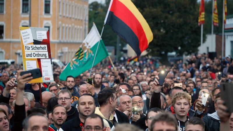 The far-right group “Pro Chemnitz” stage a protest at the entrance to the stadium of Chemnitz FC. Photograph: Odd Andersen/AFP