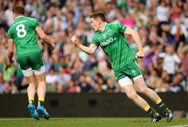 Ireland's Conor McManus celebrates after Darren Hughes scores a goal against Australia in the 2014 International Rules Series. Photograph: Cathal Noonan/Inpho