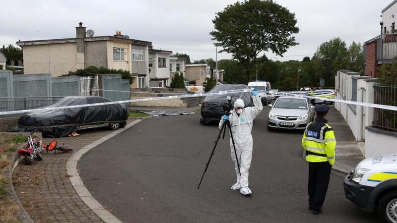 Garda forensic teams at Avonbeg Gardens, Tallaght on Friday. Photograph: Collins.