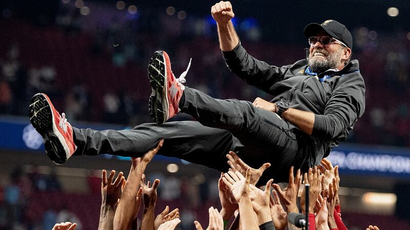 Liverpool manager Jürgen Klopp is thrown in the air as he celebrates with his players after winning the Champions League final against Tottenham Hotspur in Madrid in June. Photograph: Matthias Hangst/Getty Images