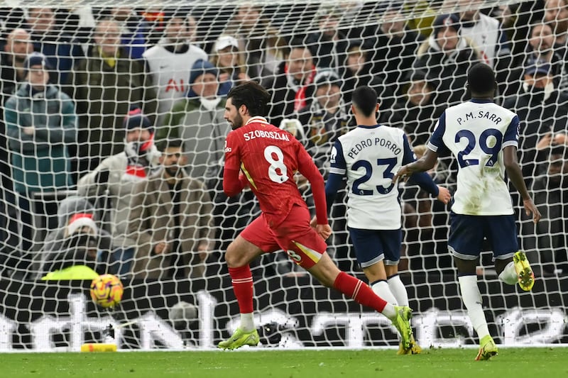 Dominik Szoboszlai celebrates scoring Liverpool's third goal against Tottenham Hotspur. Photograph: Glyn Kirk/AFP via Getty Images