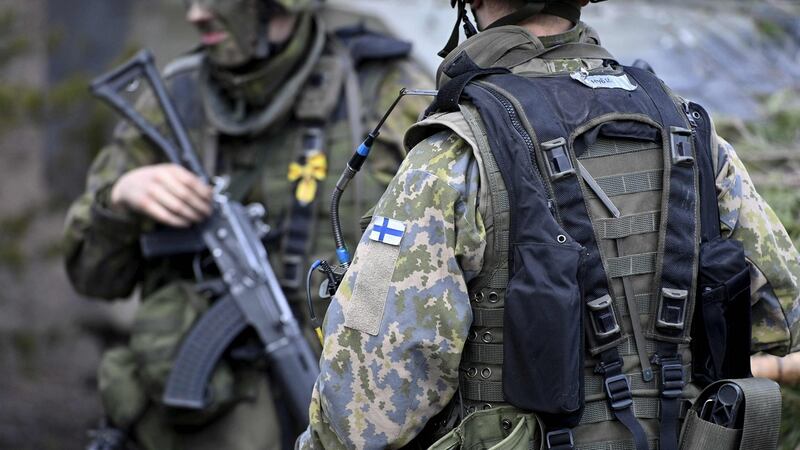 Finnish soldiers at the Arrow 22 exercise at the Niinisalo garrison in Kankaanpää, western Finland, earlier this month.  Finnish president Sauli Niinisto and prime minister Sanna Marin have  in recent days expressed their support for Nato membership. Photograph: Heikki Saukkomaa/Lehtikuva/AFP/Getty