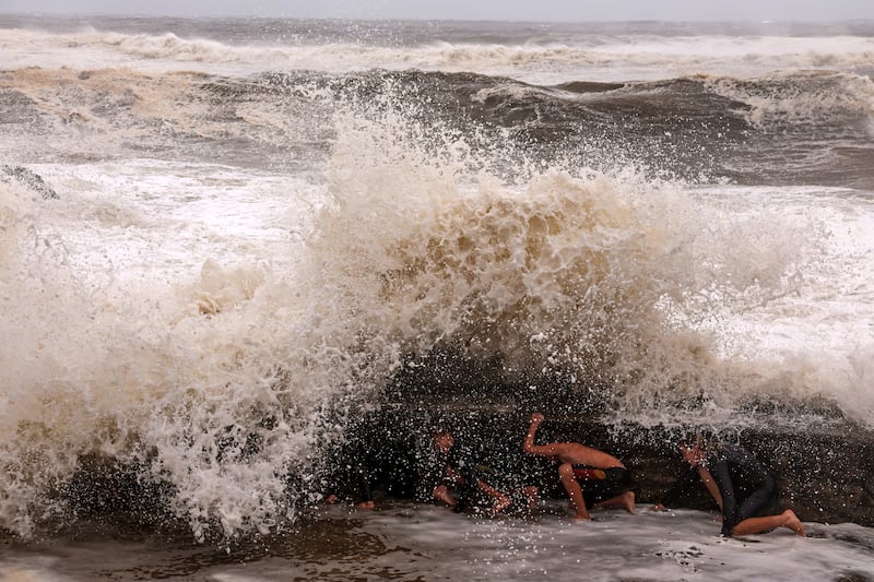 Record-breaking waves caused by the outer fringe of Cyclone Alfred at Point Danger in Coolangatta. Photograph: David Gray/AFP