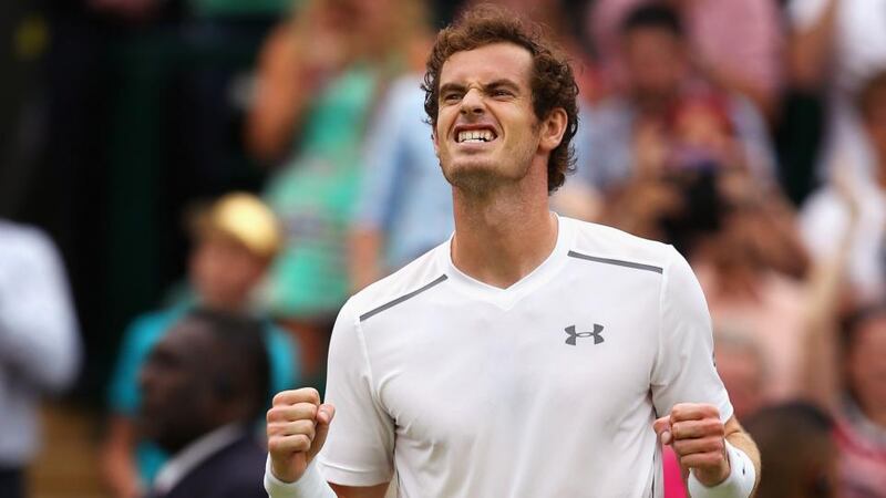 Andy Murray celebrates his Wimbledon quarter-final victory over Vasek Pospisil of Canada as he set up a semi-final showdown with Roger Federer. Photograph:  Ian Walton/Getty Images