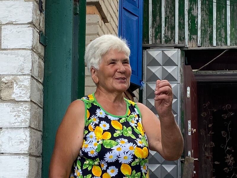 Thank you, thank you, thank you,' Vera Stozhenko (67) tells volunteers from the Kyiv-based NGO who replaced her destroyed roof. Photograph: Lara Marlowe