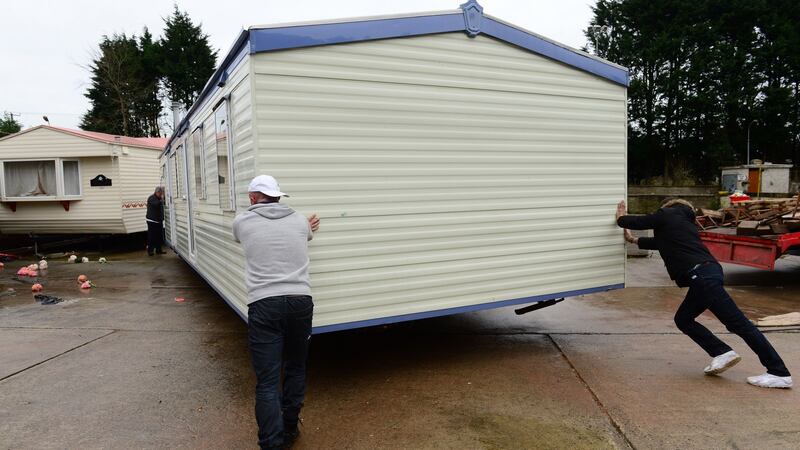 A home being prepared for transportation following an eviction notice at the site in Dundalk.