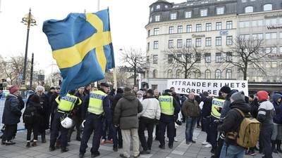 Masked mob threatens migrants in Stockholm rampage