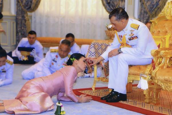 Thai king marries consort and makes her queen
