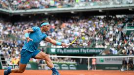 Rafael Nadal gets off to a delayed winning start at French Open