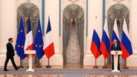 Mixed messages from Paris and Moscow on Ukraine talks appear to suit Putin
