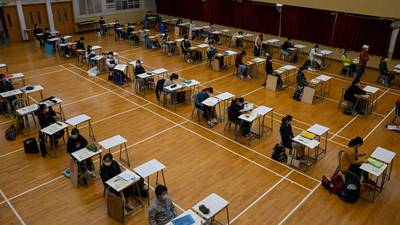 Masked Hong Kong students take final school exams